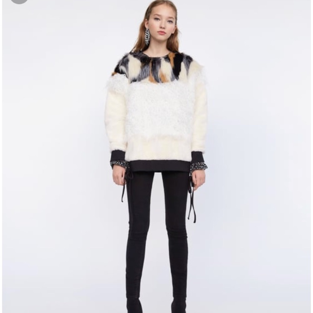 Perfect faux fur sweatshirt. New with tag